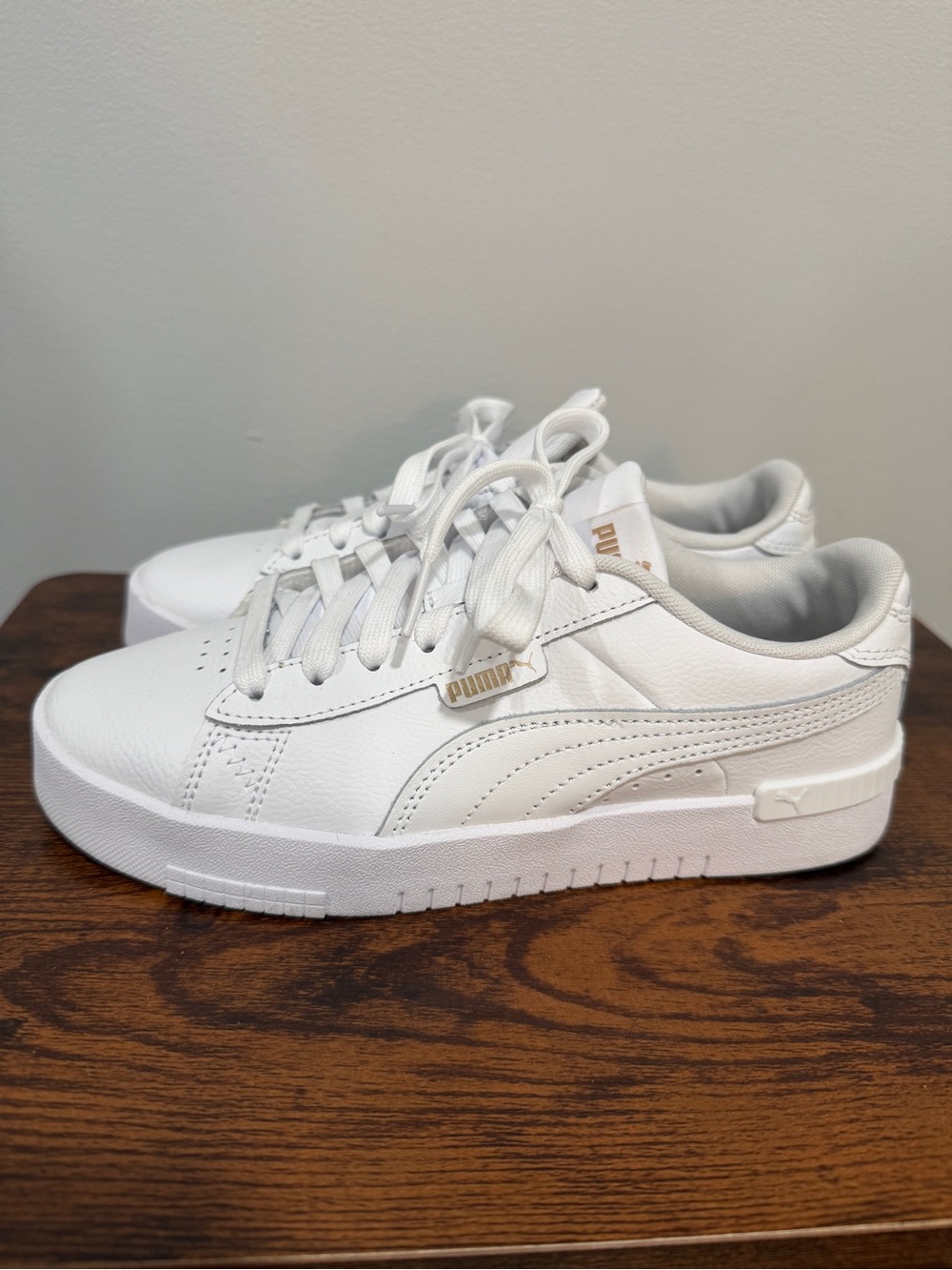 Puma Women's White Low-Top Leather Sneakers with Gold Accents